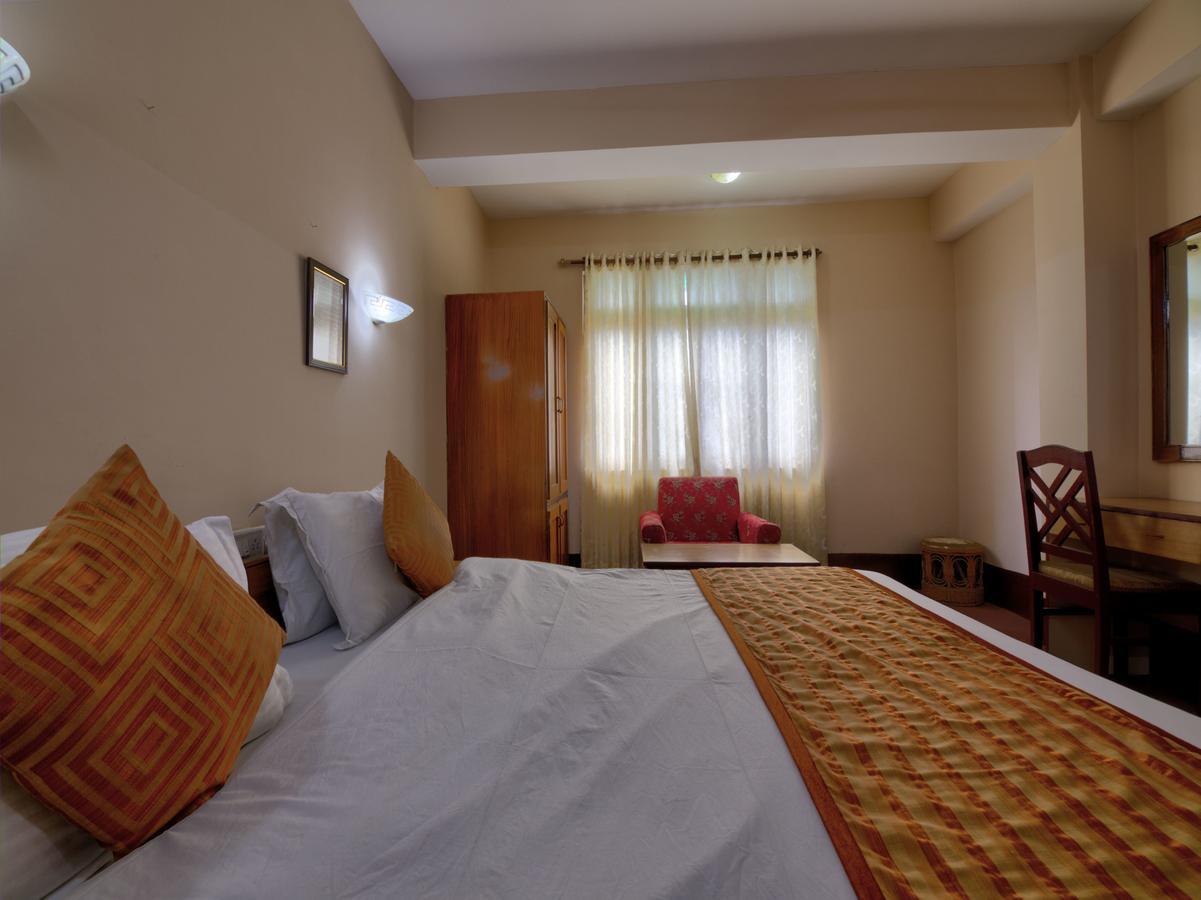 Oyo 13521 Sudhriti Hotel Siliguri Dış mekan fotoğraf